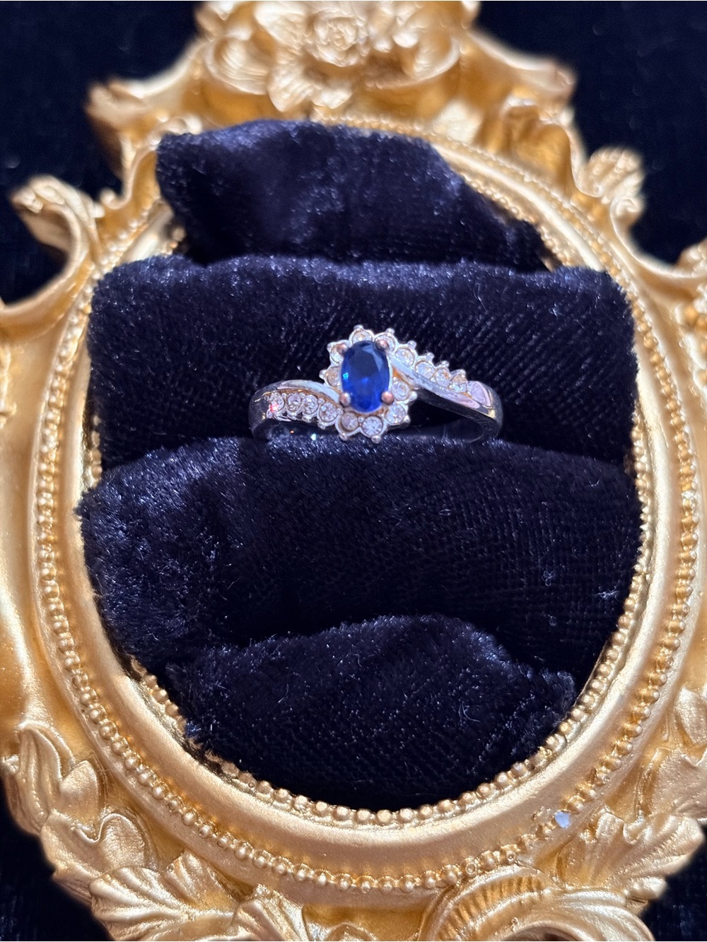 Silver Ring with Blue Sapphire Center and Accent Stones
